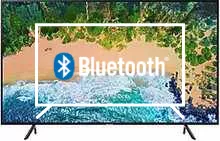 Connect Bluetooth speakers or headphones to Samsung 75NU7100